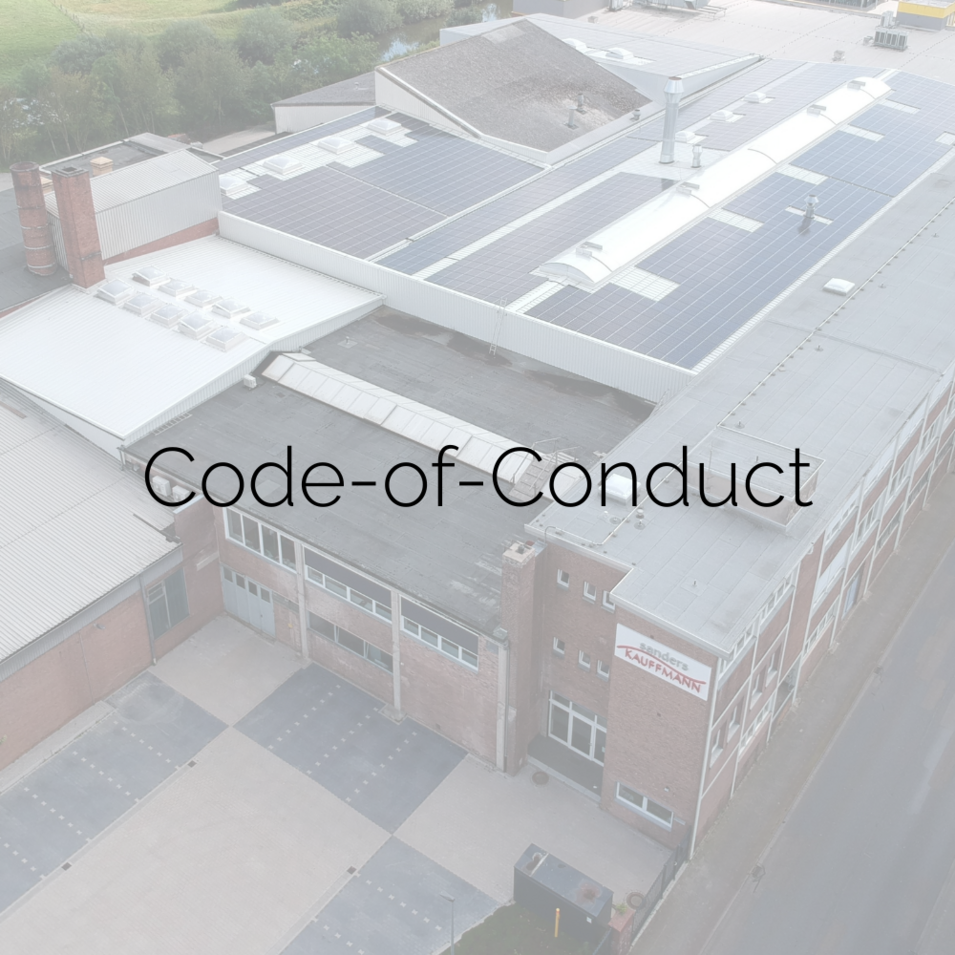 Luftaufnahme von unserem Hauptsitz in Bramsche. Bildaufschrift "Code-of-Conduct".