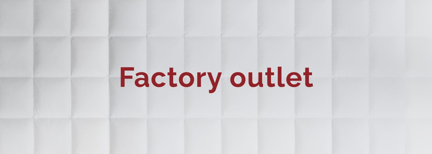 “Factory outlet” lettering in red capital letters on a light background.