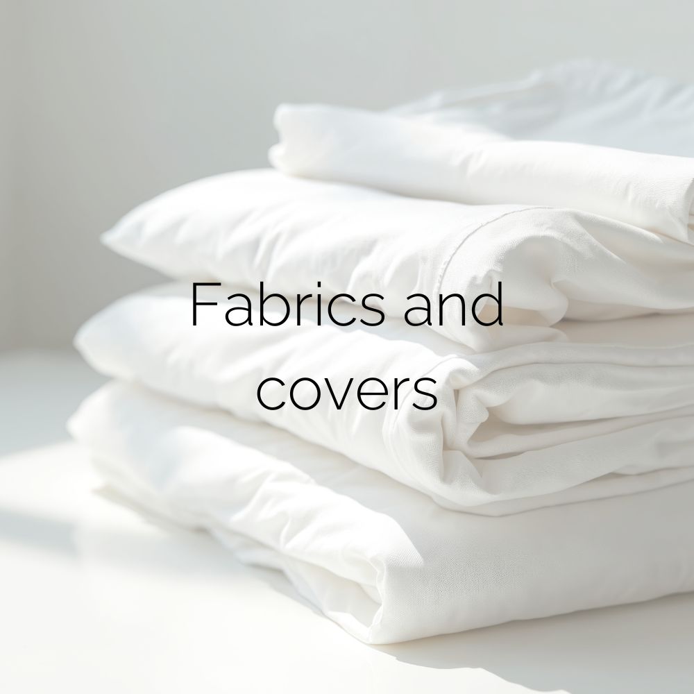 Several pillowcases neatly folded and stacked on top of each other. Image caption: “Fabric and covers.”